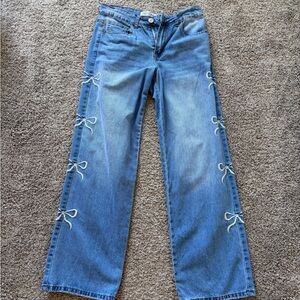 GOGO Blue Flare Mid Rise Jeans with Bow Accents